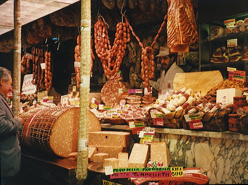 Indoor Italian market vendors cheeses and salami