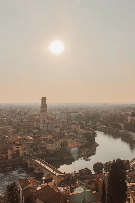 Ponte Pietra sunset reflection Adige