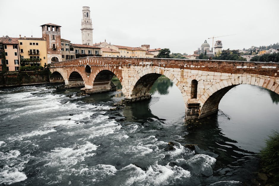 Bridge Ponte Pietra sunrise river