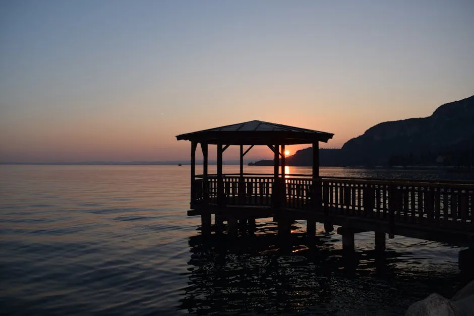 Lake Garda sunset reflection pier